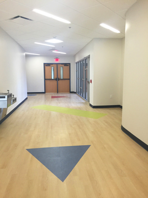 Wood floor installation at a Houston school.